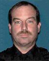 Paul W. Jurgens, 47, Levittown, N.Y., USA - Police Officer Paul Jurgens was killed in the September 11, 2001, terrorist attacks while attempting to rescue the victims trapped in the World Trade Center. Officer Jurgens was assigned to the police academy, and is survived by his wife and three young children. Officer Jurgens' nephew, Senior Court Officer Thomas Jurgens, of the New York State Office of Court Administration, was also killed on 9/11 while responding to the scene. Port Authority Police Department.