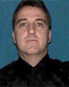 Officer John J. Lennon Jr., 44, Howell, N.J., USA - Officer John Lennon was killed in the September 11, 2001, terrorist attacks while attempting to rescue the victims trapped in the World Trade Center. Port Authority Police Department.