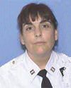 Captain Kathy Nancy Mazza-Delosh, 46, Farmingdale, N.Y., USA - Captain Kathy Mazza was killed in the September 11, 2001, terrorist attacks while attempting to rescue the victims trapped in the World Trade Center. She was leading a group of people down stairs when the building started to collapse. Using her 9mm sidearm, Captain Mazza shot out glass walls, enabling many to escape. Captain Mazza was the first female commander of the Port Authority of New York and New Jersey Police Department. Port Authority Police Department.